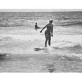 Woman riding a surfboard, Freshwater Beach