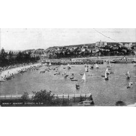 Sailing boats at Manly Cove near wharf