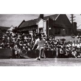 Unidentified man playing tennis