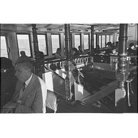 Passengers on a Manly Ferry, showing the ferry's interior