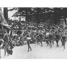 Manly female march past team