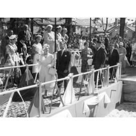 Queen Mother being escorted by Judge Adrian Curlewis, 1958