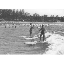 Surf board riding at Manly Beach, c late 1930s