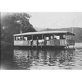 Houseboat on Cowan Creek, c 1920