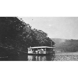 Houseboat on Cowan Creek, c 1920