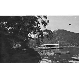 Houseboat on Cowan Creek, c 1920
