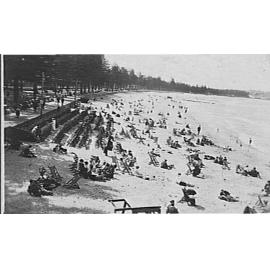 Rows of deck-chairs on the sand at Manly Beach, c 1921