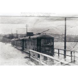 A tram marooned on Pittwater Road as Manly Lagoon floods, 1931