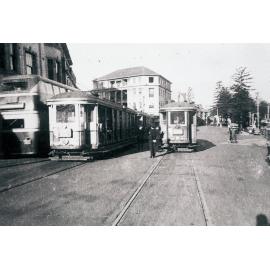 Trams and bus, corner Belgrave Street and West Esplanade