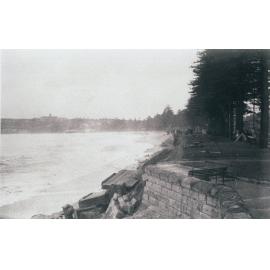 Damaged sea wall at Queenscliff Beach following a storm