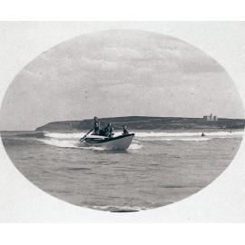 Surf boat in action at Freshwater Beach