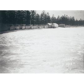 Dressing sheds on Manly Beach during high seas