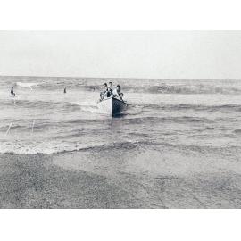 Surf boat in action at Manly Beach