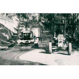 Water tanker and grader working on Nioka Road Narrabeen