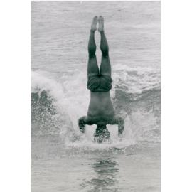 Handstand while surfing