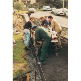 Warringah Council Workers laying kerbing and guttering