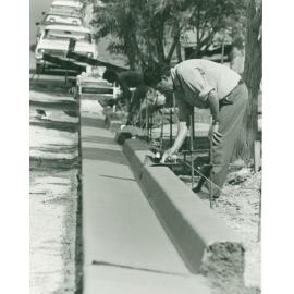 Council workers creating kerb and guttering