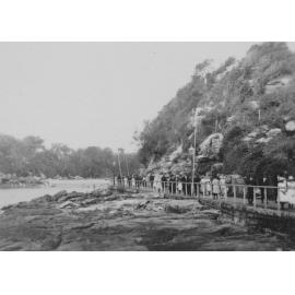 Crowds walk along the Fairy Bower Walkway to Shelly Beach, Manly, c1920s