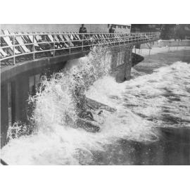 Waves breaking against the wall of Manly Surf Pavilion, Manly, c1940s