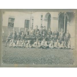 Group portrait of students and teachers, at an unidentified location and institution, c1930s