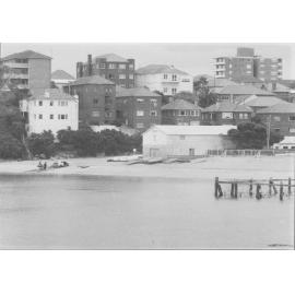 Residential flats, the beach and baths at Little Manly Cove, c1970s