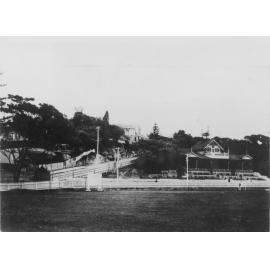 View looking west across Manly Oval, with the grandstand, Sydney Road and Dalley's Castle, Manly, pre 1939