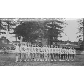 Group portrait of twenty-one women in costume at Manly Oval, Manly, c1930s