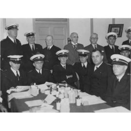 Group portrait of Superintendent Davey and unidentified ambulance officers, Manly Ambulance Station, Raglan Street, Manly, c1934 to 1938