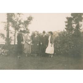 Ireland family in front garden of Koala House, Bayview.