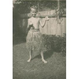 Ken Carter in a grass skirt.