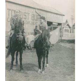 Ken and Terry Carter riding horses at Blackheath, New South Wales.