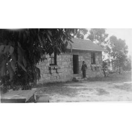 Steve Traveller outside his stone cottage corner Myoora Road and Mona Vale Road, Terrey Hills