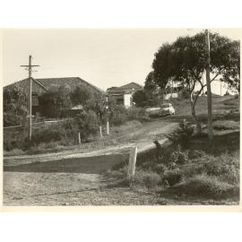 Armstrong Street from Prince Edward Road prior to sealing, Seaforth, 1956