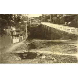 Clifford Avenue with temporary walkways over drainage trench, Fairlight, 1928