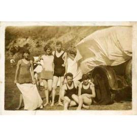 Nancy Wooldridge and Walter Carpenter standing in centre at Newport Beach
