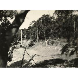 Construction continues on Callicoma Road, Seaforth, September 1956