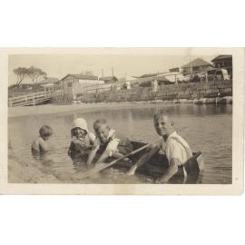 Kingsley and Starr children in Canoe at Collaroy Beach