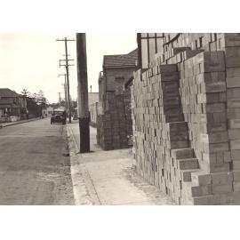 Whistler Street near Carlton Street, brick pile obstruction, Manly, c1940s