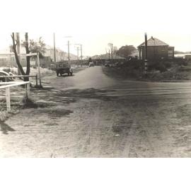 Unidentified street intersection with ice truck, number 5134, c1940s