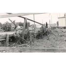 Timber supports in cleared area or garden, c1940s