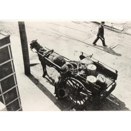 Garbage collector's wife, garbage cart, tramlines