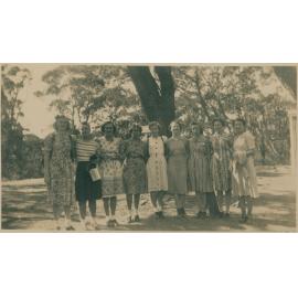 A group of women standing in a yard, Narrabeen, 1943