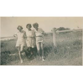 Three women at a fence, Narrabeen, 1943