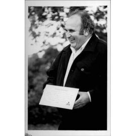 Descendent of George and Mary Mulhall Holding Plaque, Palm Beach, 1992