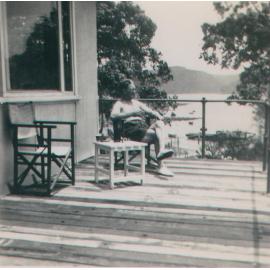 Gill Grandfather sitting on Verandah of Home, Scotland Island, c1960