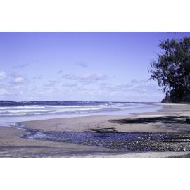 Sandy Ocean Beach showing freshwater Stream, Minnie Water