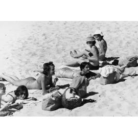 Group of women sunbathing at Manly Beach, Manly, c1967-1973