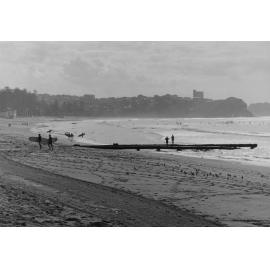 Stormwater drain and surfers at Manly Beach, Manly, c1967–1973