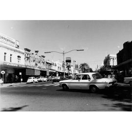 White car turning into The Corso, Manly, c1967–1973
