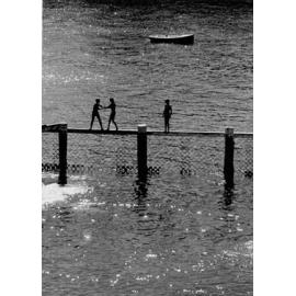 Children standing on the railing at Little Manly Pool, c1967–1973